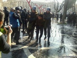 A protestor being detained in Baku on 10 March 2013. (Picture courtesy of RFE/RL)